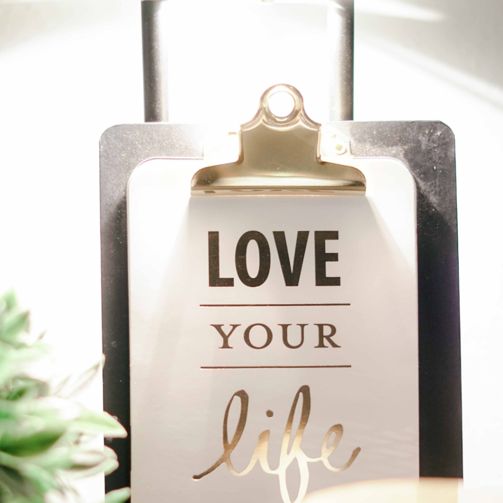 clip board with text love your life
